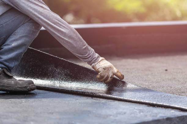 Professional Basement Waterproofing technician working in Plymouth, NC